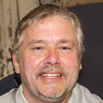 Male customer smiling with a satisfied expression